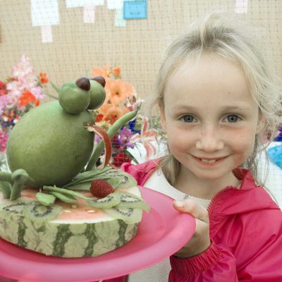 Junior champion..Olivia Bell of Keswick who won the under seven junioe section in the industrial tent shows of her Mango frog.